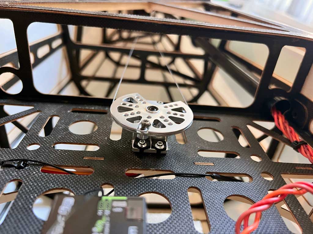 Close up of ProModeler PDRS50PP-25T installed within Extreme Flight model aircraft.