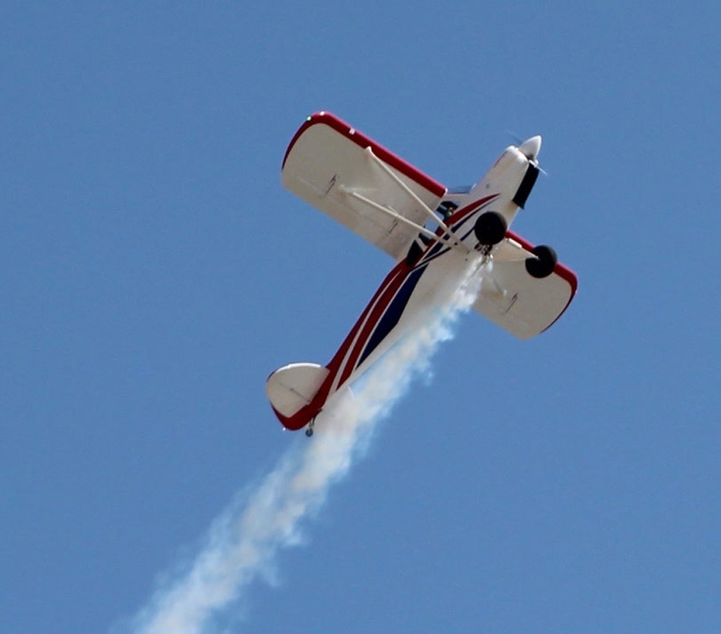 Photo of Mike Feitinger's Hangar 9 165 inch Carbon Cub FX 3 entering a loop trailing smoke