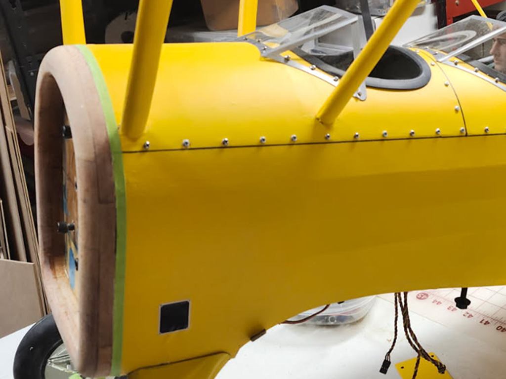 Close up photo fo forward fuselage devoid of lettering in preparation for renewing the surface with fresh Callie's Graphics