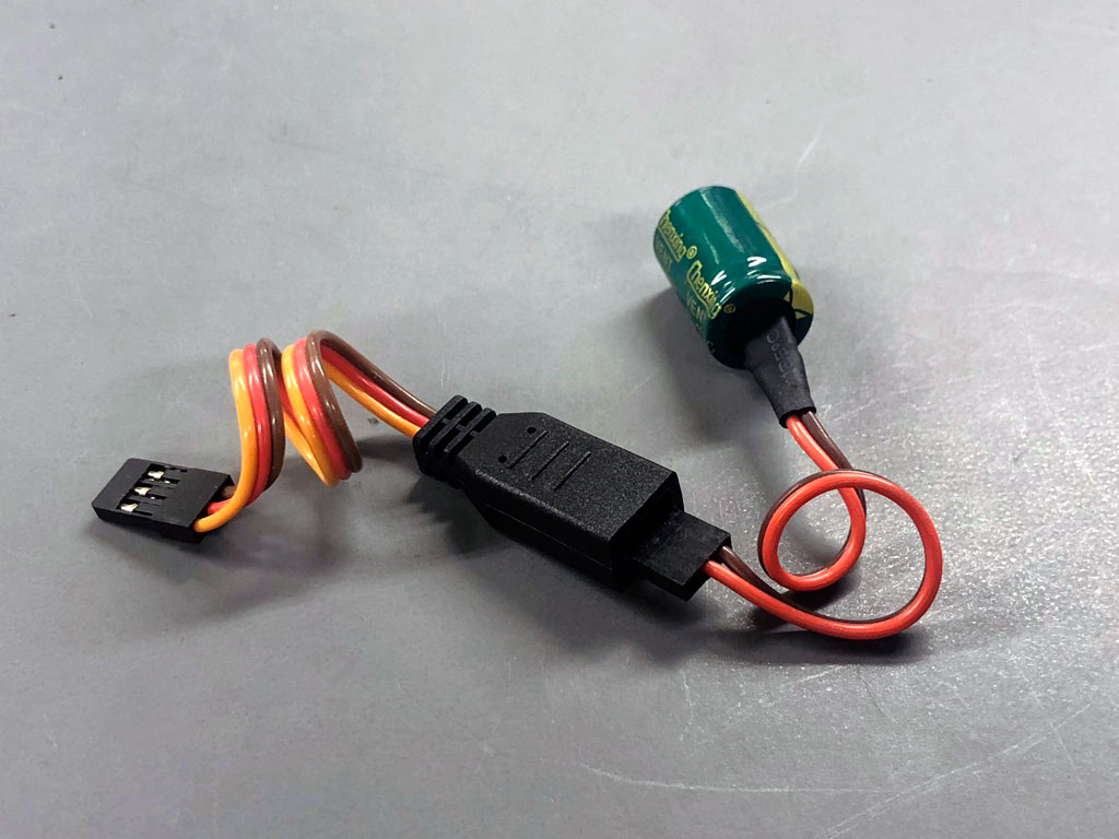 Close up photo fo a ProModeler Y-harness with capacitor attached