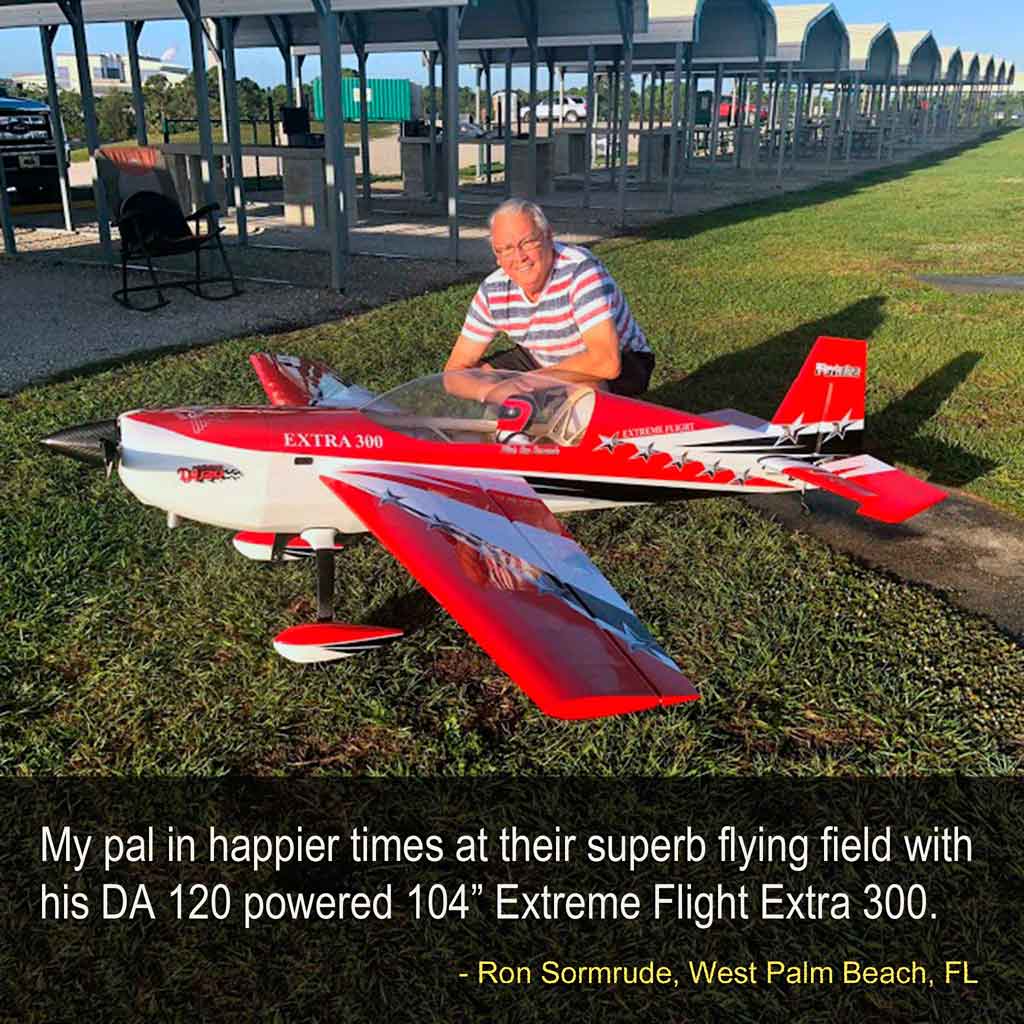 Ron Somrude kneeling behind his EF Edge 300