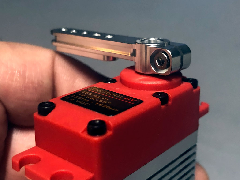 Hand holding a DS360DLHV servo fitted with a PDRS35-25T arm