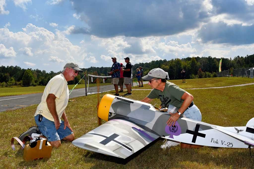 Close up of Bob and Tina Patton starting a Fokker V.25 cantilever-monoplane at Tullahoma October 2024.