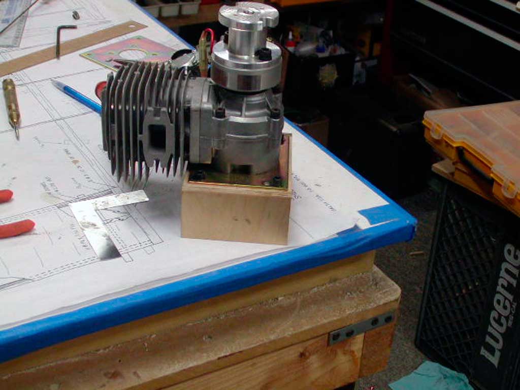 A Zenoah gas burner with magneto ignition incorporated is a long time favorite of scal modelers because they're heavier than engines with separate ignition and battery, useful weight with short nose models like WWI fighters,