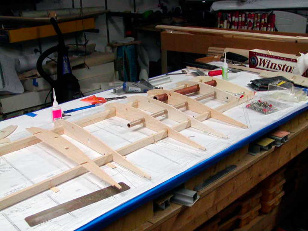 Close up of more ribs placed on a balsa wing