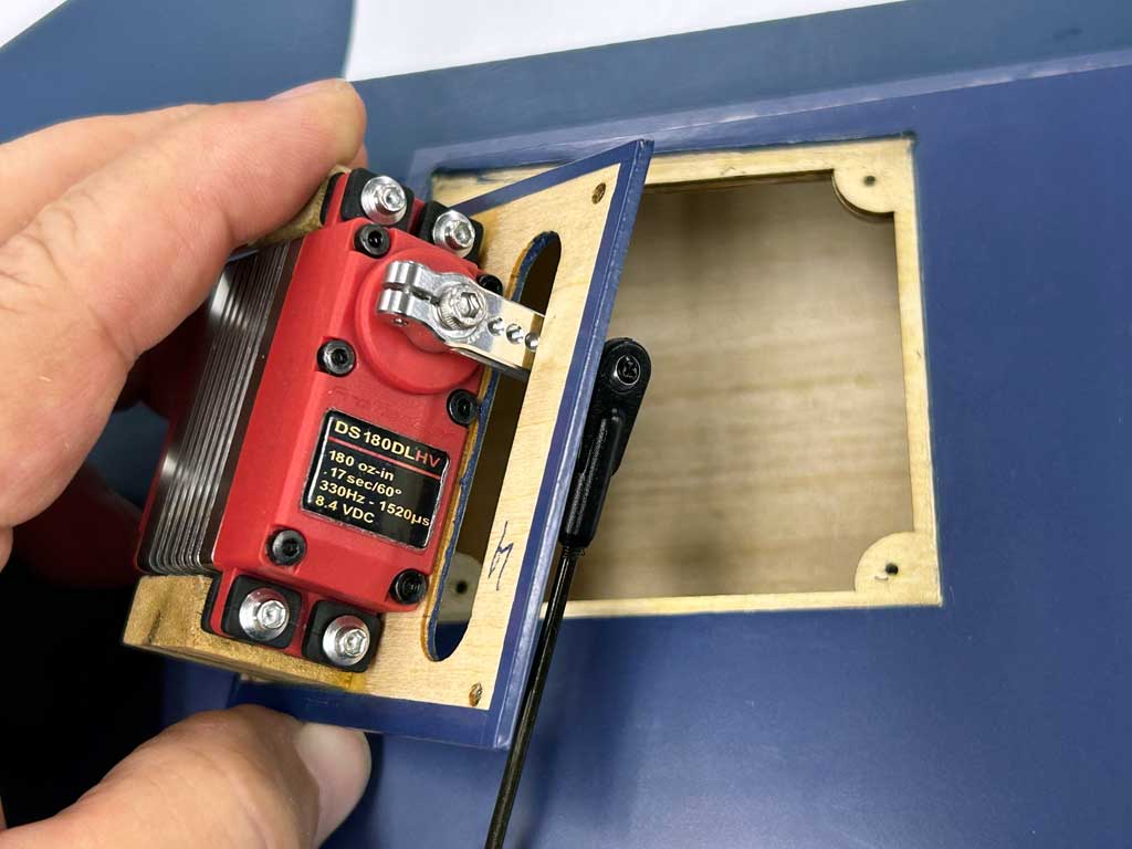 Close up of ProModeler DS180DLHV servo installed in the right wing panel of a Top Flight F4U Corsair.