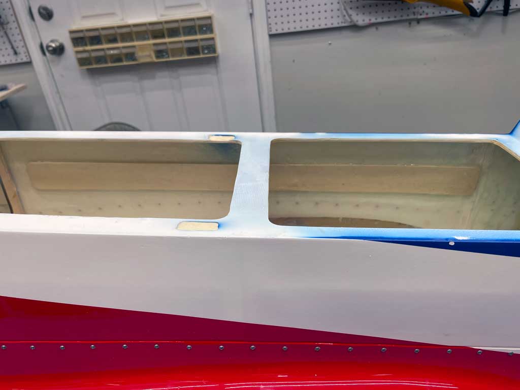 Wide view of the wing area side of the forward fuselage reinforcement of the 96" CY Models P-51 showing the addition of 2" wide strips of 1/8" thick light ply using Hysol adhesive.
