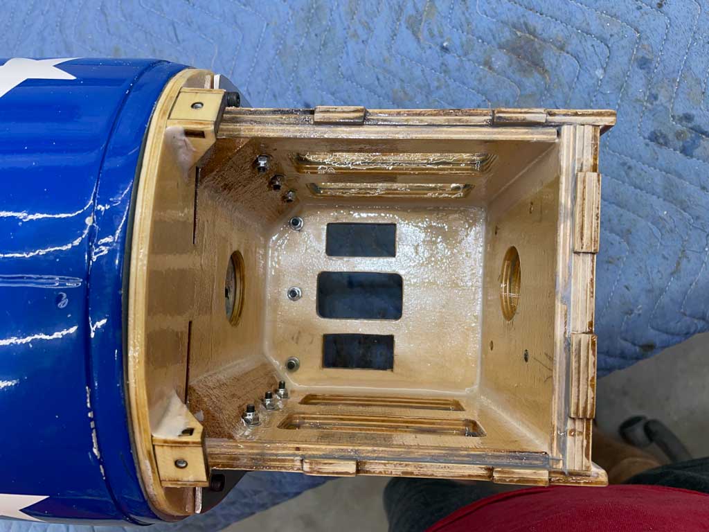 Downward view into the top of the CY Models motor box shows mounting locations for throttle and choke servos.