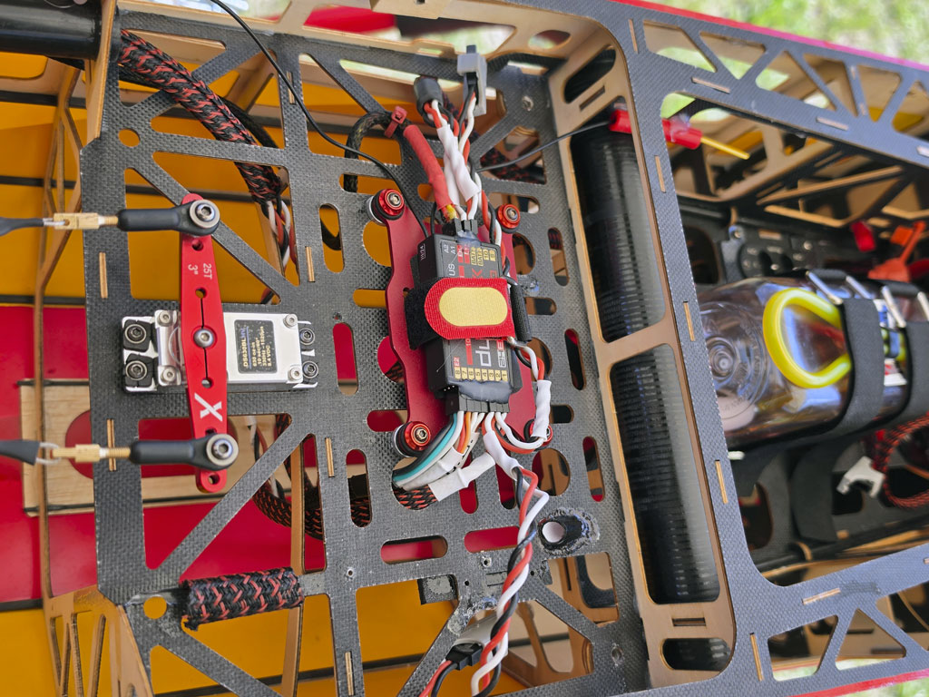Close up photo showing the receveir installaiton in an Extreme Flight 85 inch Extra 300EXP