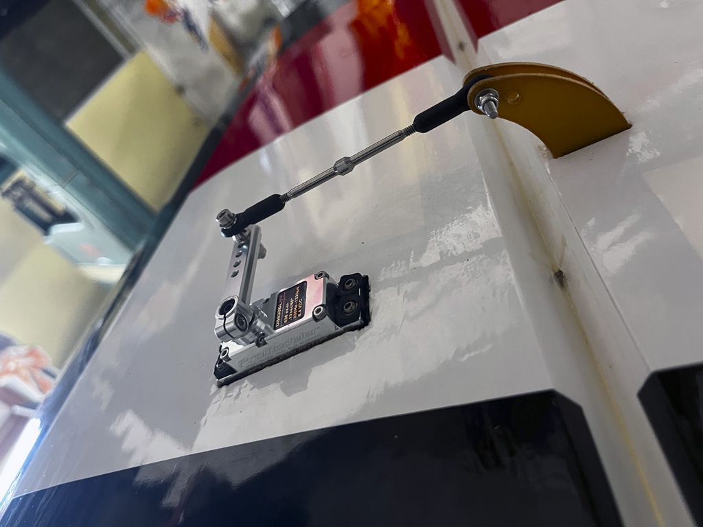 Close up photo of outboard aileron servo mounted to the Goldwing 106-inch Yak 55M wing panel