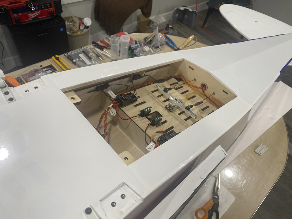 Photo of underside of model showing rudder servo installation