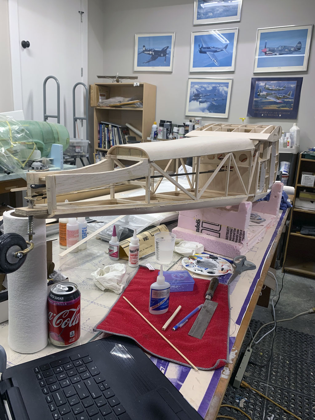 Close up photo of the fuselage construction of the Hostetler quarter scale Cessna 195 showing sheeting beginning to be installed