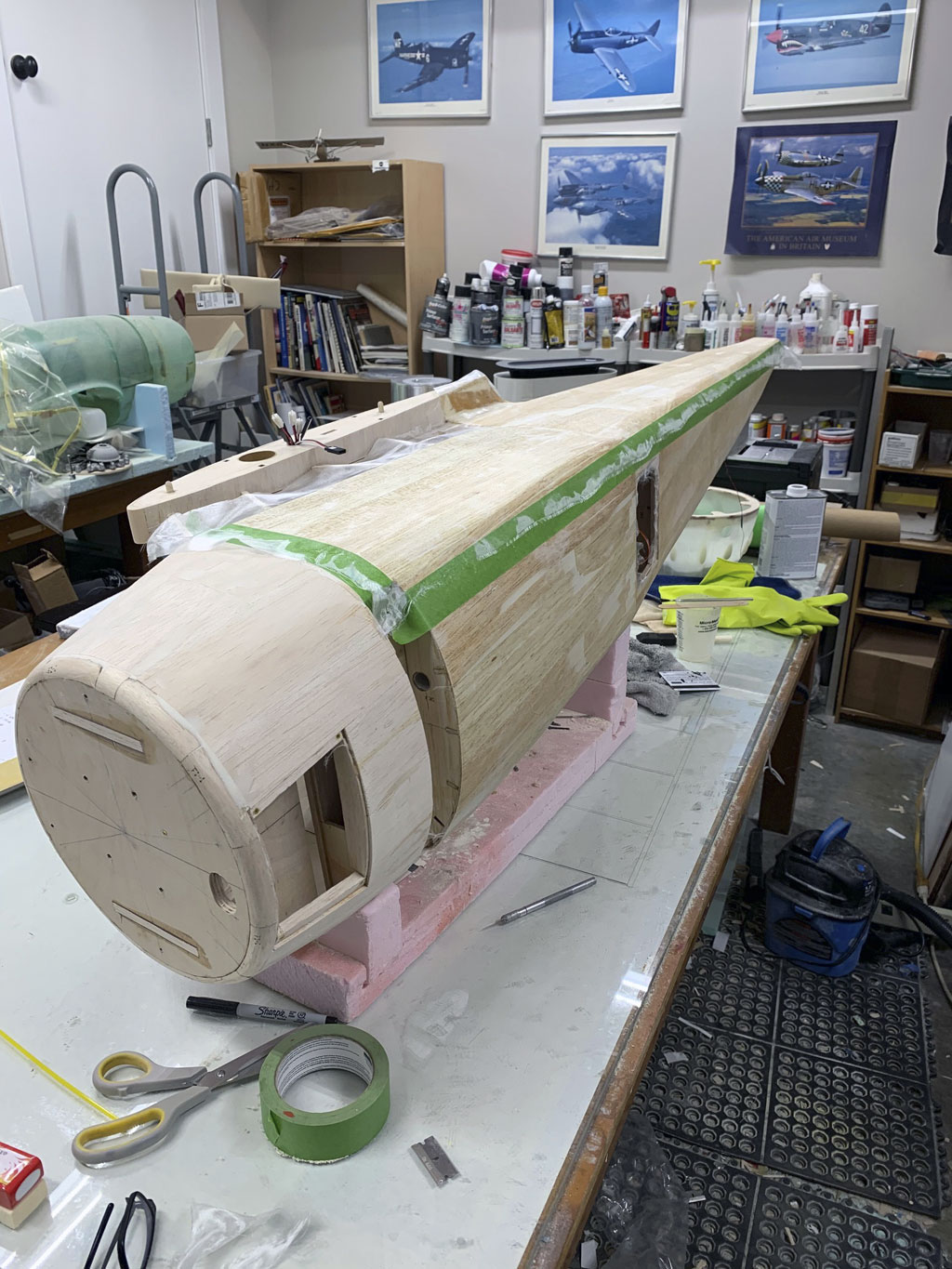 Close up photo of the fuselage construction of the Hostetler quarter scale Cessna 195 showing the plywood and glazing