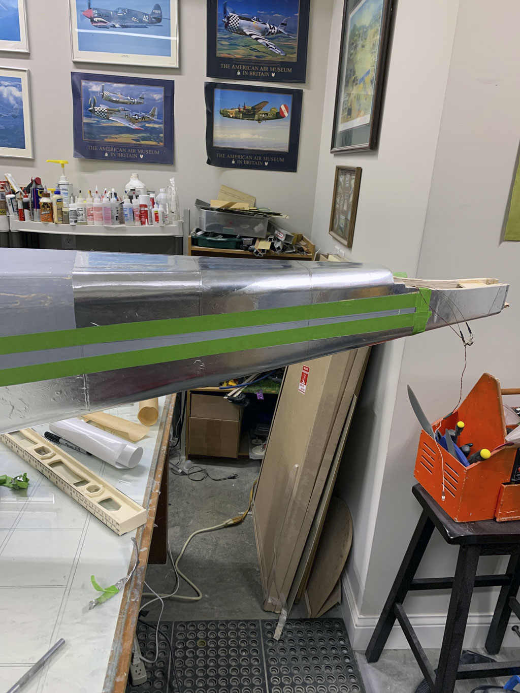 Close up of attaching Flite-Metal to the Hostetler quarter scale Cessna 195 fuselage to the bottom aft part