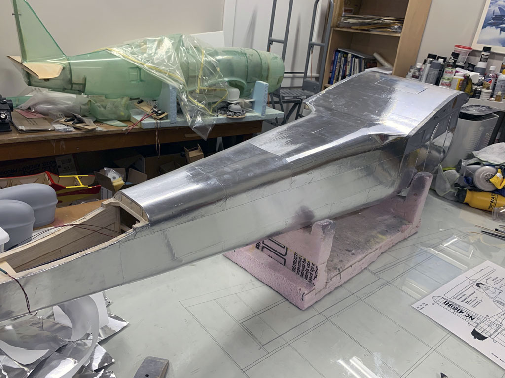 Close up photo of the fuselage construction of the Hostetler quarter scale Cessna 195 showing the Flite-Metal applied to the rest of the fuselage