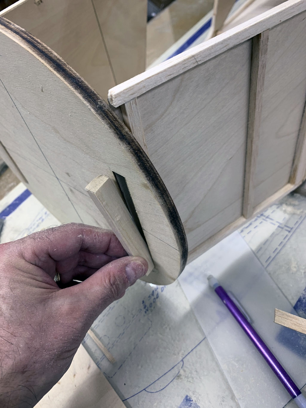 Close up photo of the forward fusleage construction of the Hostetler quarter scale Cessna 195 and the blocks securing the firewall