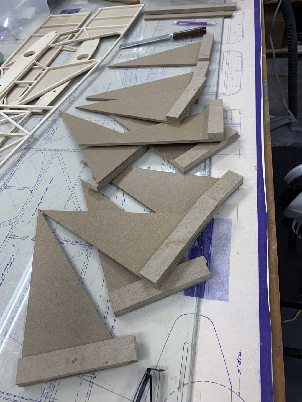 Close up photo of the framing squares made to accurately align the fusleage construction of the Hostetler quarter scale Cessna 195