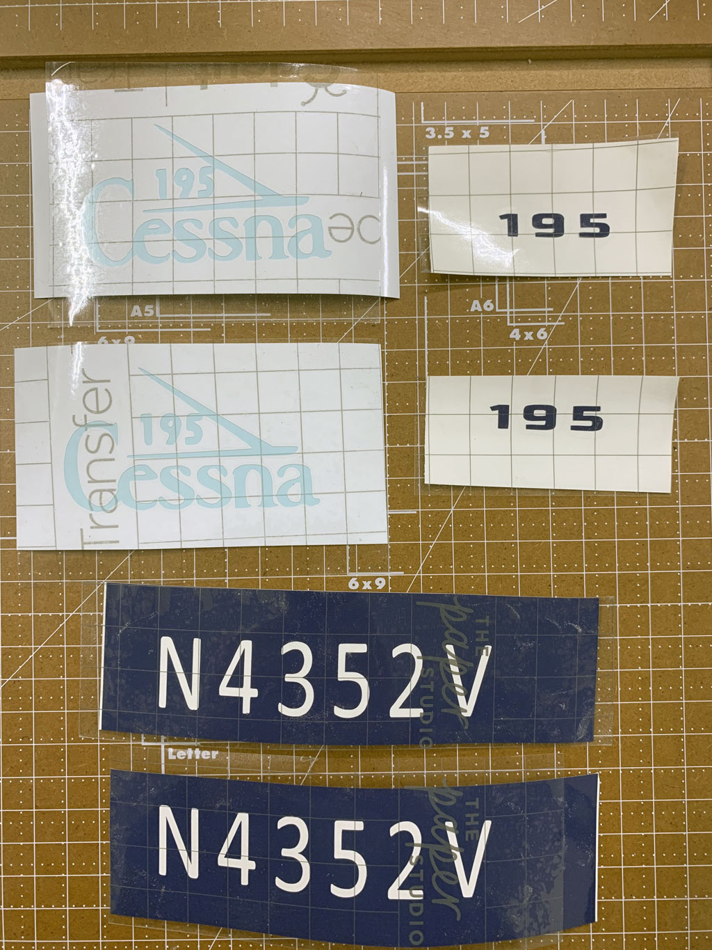 Photo of nomenclature for the Cessna 195 consisting of paint masks