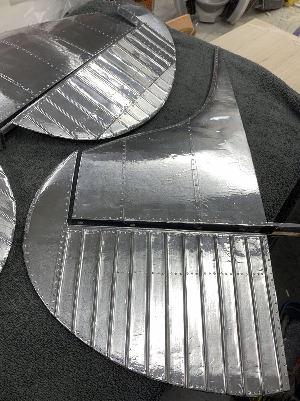 Close up photo of the stabs detailed with rivet heads and covered in Flite-Metal for a Hostetler quarter scale Cessna 195 model