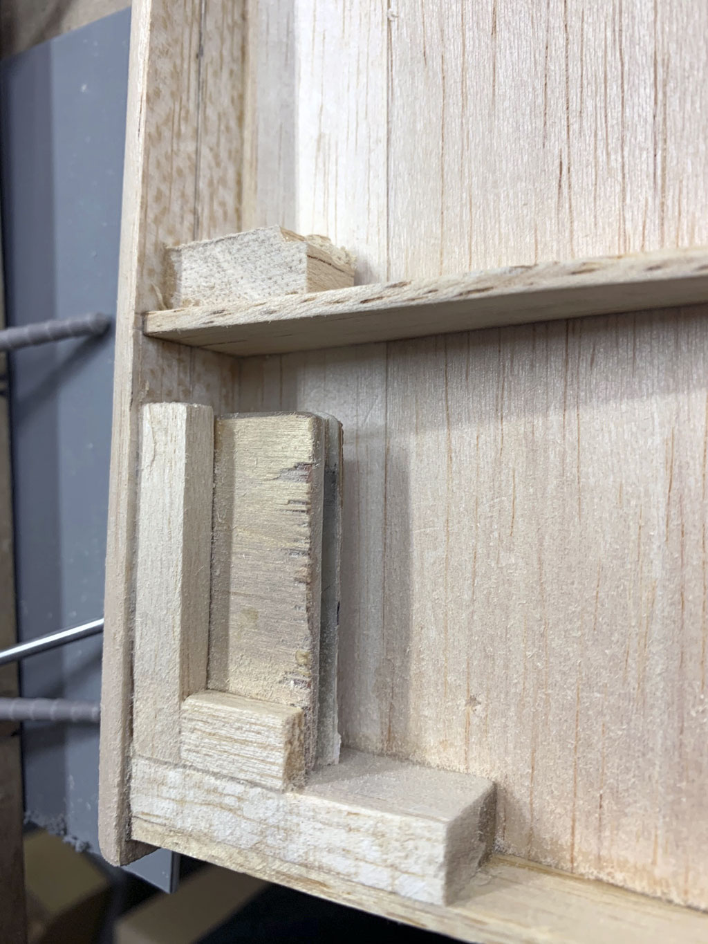 Close up of the blocking for the rotary drive structure within the rudder of the Hostetler quarter scale Cessna 195