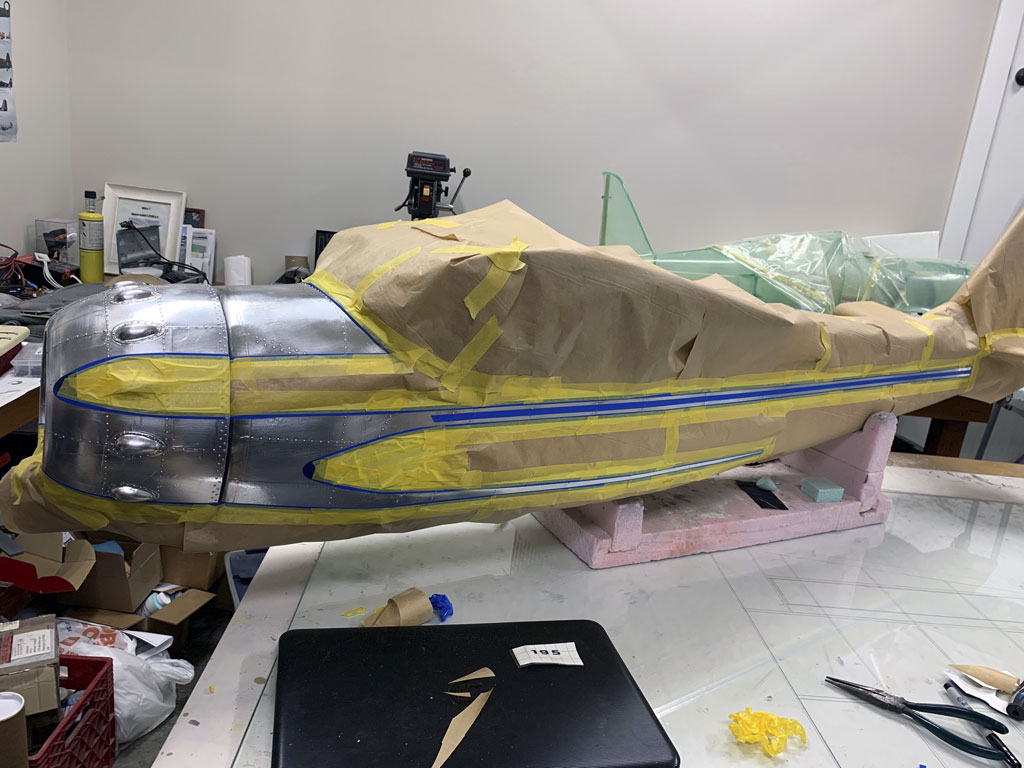 Wide angle photo of Hostetler Cessna 195 masked off for paint