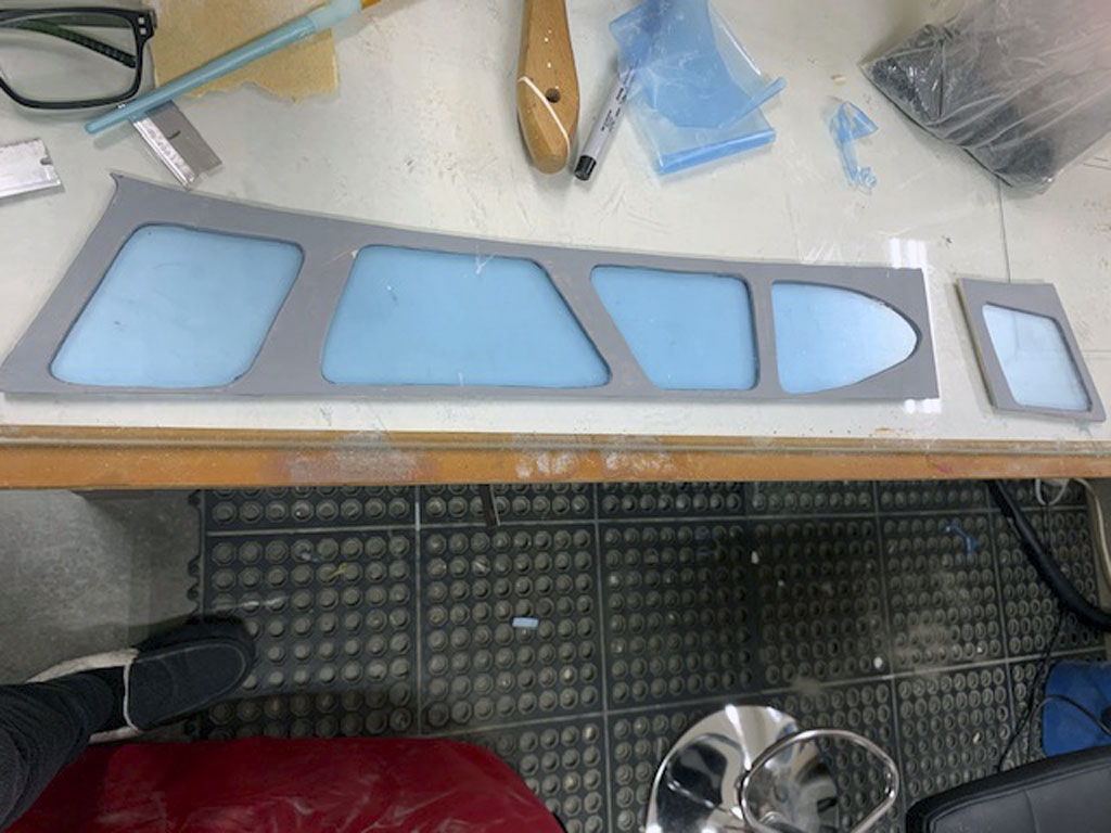 Close up photo of the fuselage construction of the Hostetler quarter scale Cessna 195 showing the plywood and glazing