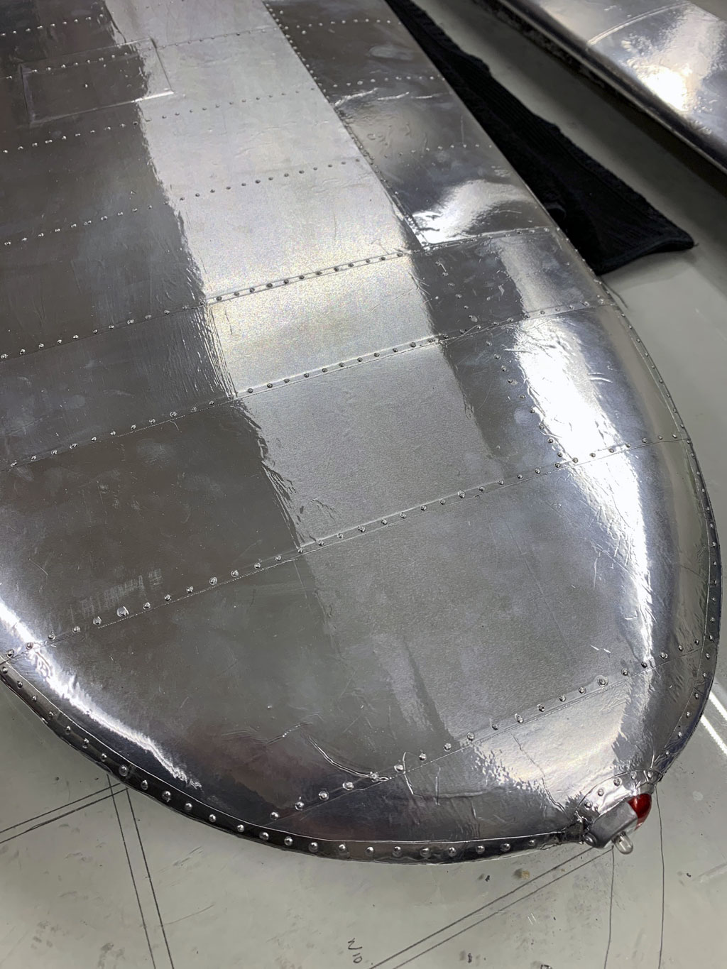 Close up photo of the Hostetler quarter scale Cessna 195 wing tip with rivet detail