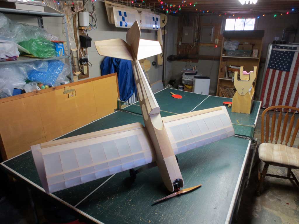 Close up of fully covered and finished SIG Four-Star 40 model airplane.