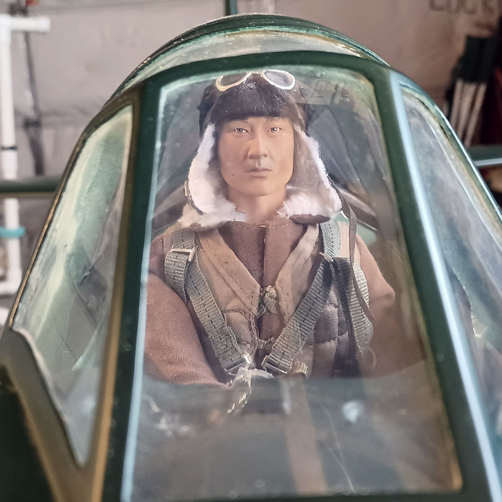 Close up of Warbird Pilots 12" tall 1/5th scale Japanese full body pilot figure mounted within the TopRC Models 5th scale A6M5 Zero cockpit