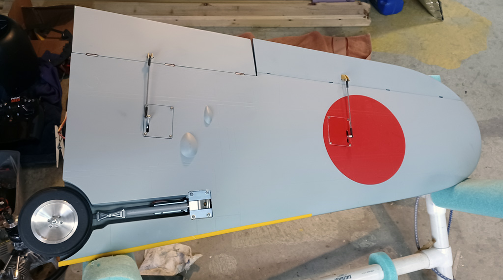 Wide angle photo of the und4erside of the wing panel of the TopRC Models 5th scale A6M5 Zero