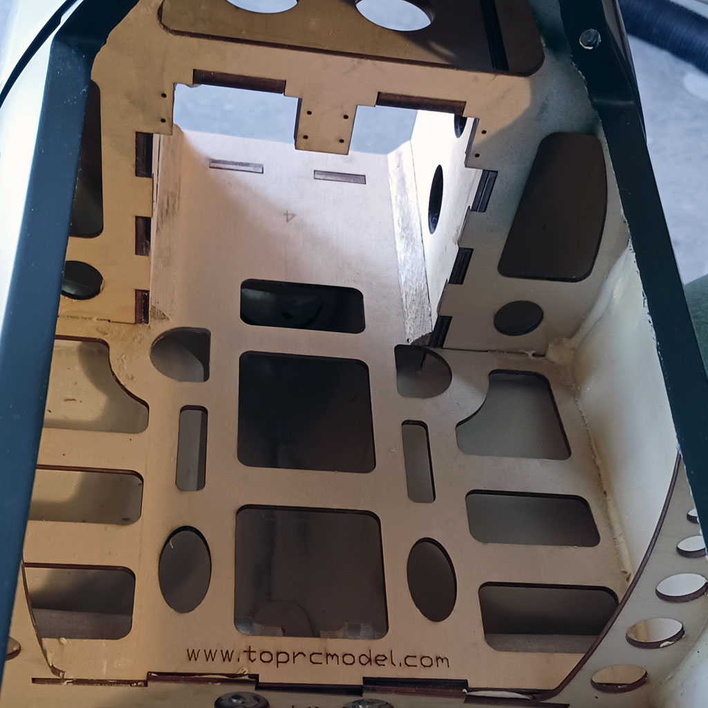 Close up photo of the fuselage interior at the wing saddle of the TopRC Models 5th scale A6M5 Zero fuselage