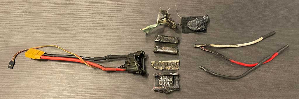 Close up image of a Castle Creations ESC which has burned to destruction.