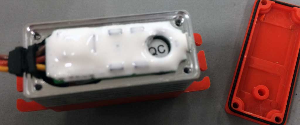Close up of the potting compound applied to a ProModeler servo circuit board.