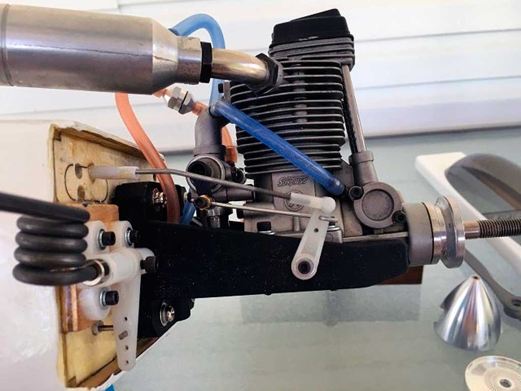 Close up of side mounting an OS MAX FS-91 in a Tower Hobbies 62in Kaos.