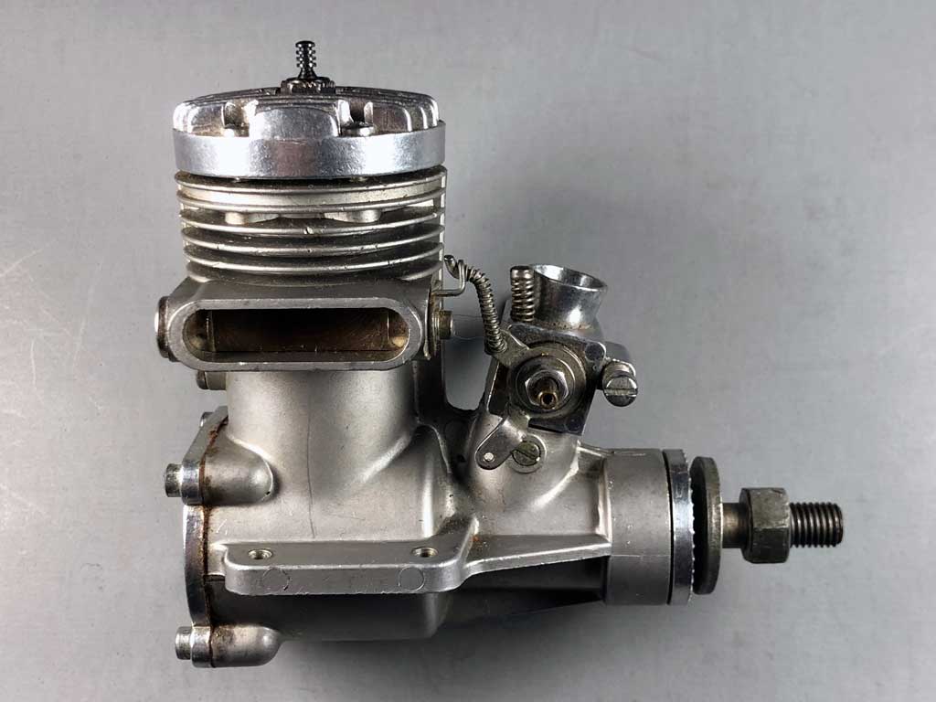 Close up of a Veco .61 as designed by multiple world record holder Clarence Lee sporting a loop charge side exhaust with rotary valve.