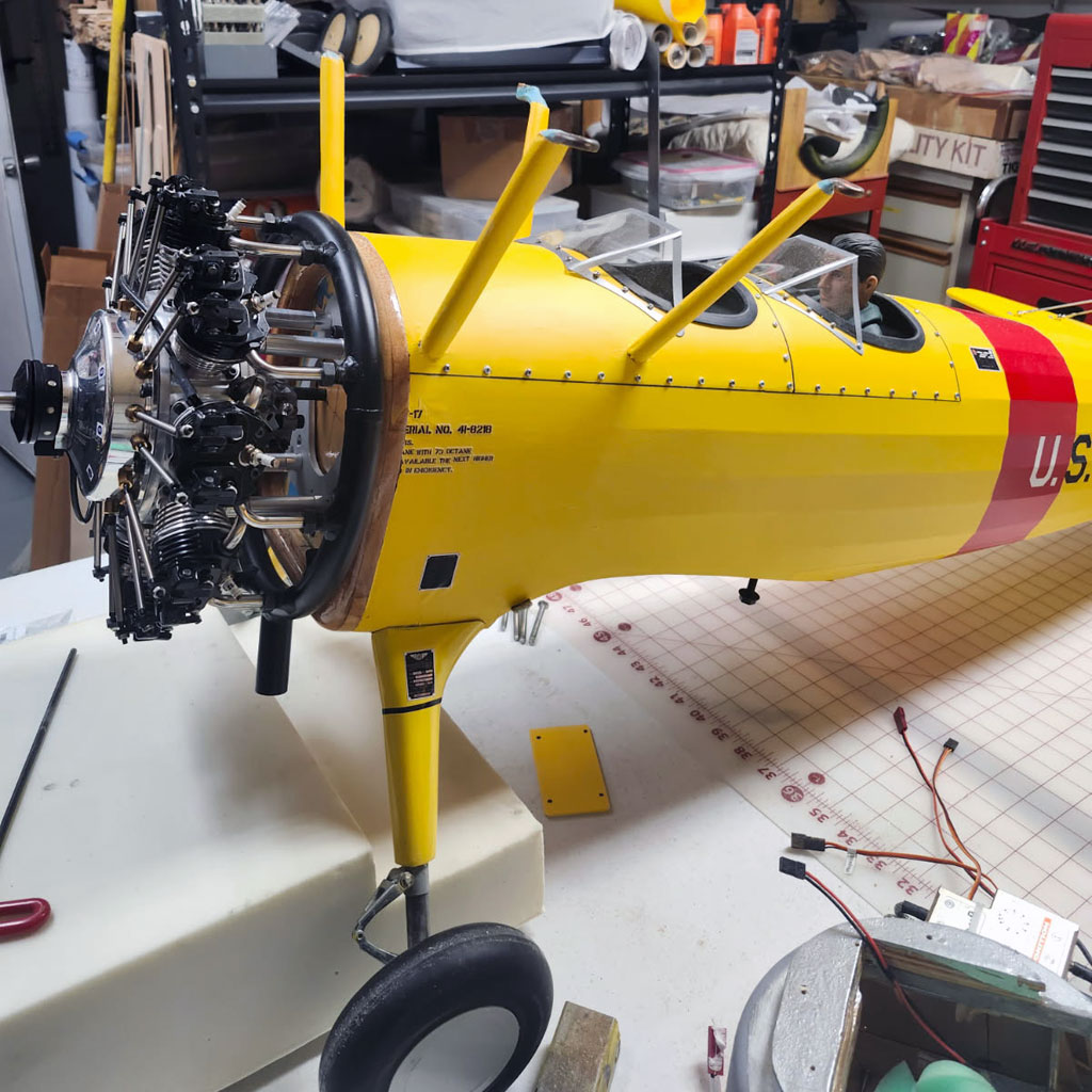 Close up photo of UMS 9-115 enigne trial hung on  Ziroli 5th scale Stearman with cowl ring attached and 1/2-inch standoffs