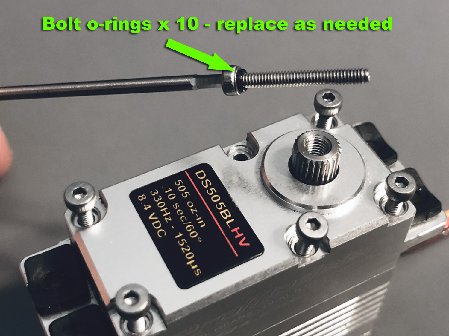 Close up photo of bolt with tiny o-ring for securing ProModeler DS505 transmission assembly following repair