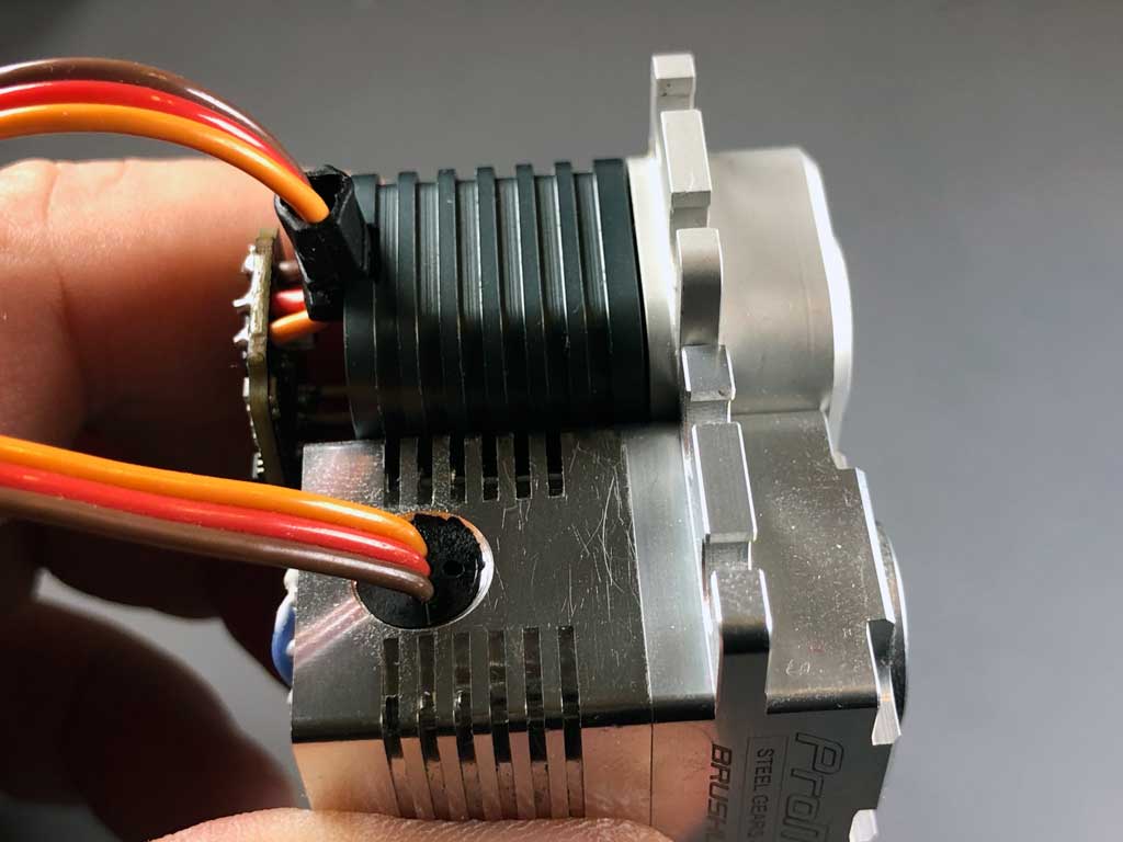 3-wire lead exiting the case of AccuTORQ 600SG may allow the entry of contaminants while that of the ProModeler DS630BLHV is sealed against entry.