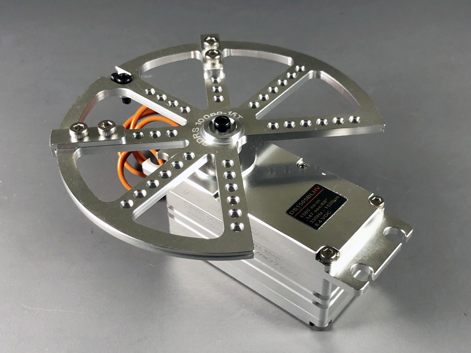 Close up photo of ProModeler's low profile giant servo, the DS1505BLHV equipped with the PDRS100PP-15T pulley for pull-pull setups