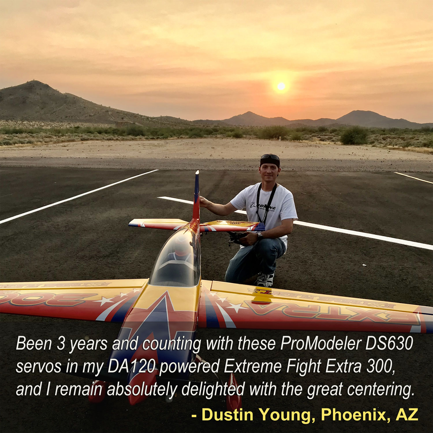 Photo of Dustin Young standing besides his giant scale Extreme Flight Extra 300 model with DA120 engine stating, 'Been 3 years and counting with these ProModeler DS630 servos in my DA120 powered Extreme Fight Extra 300, and I remain absolutely delighted with the great centering.
