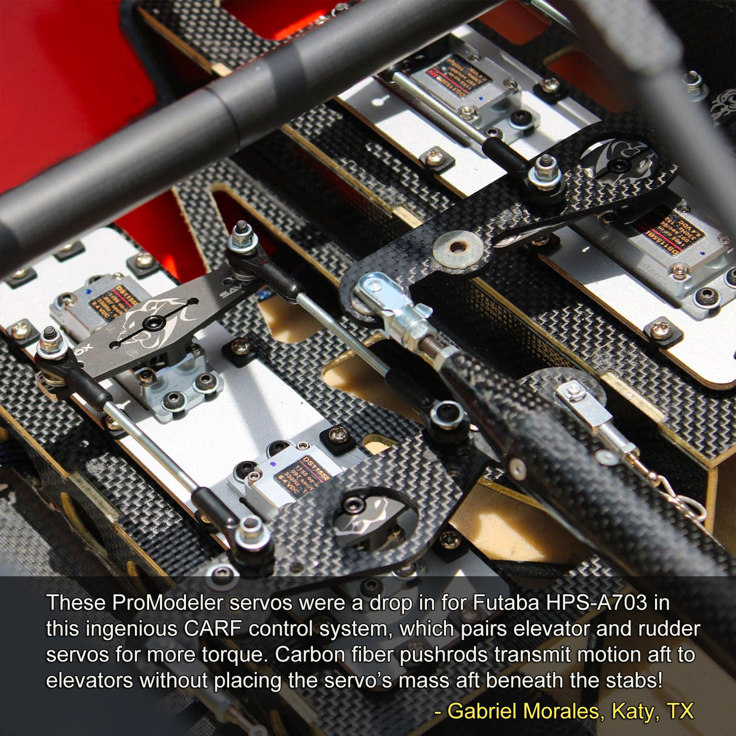 Close up of CARF mechanics pairing ProModeler rudder and elevator servos within an Extra 330LX
