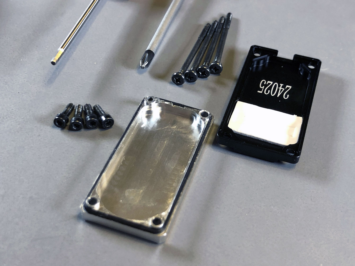 Close up of the electronic covers for both ProModeler DS930BLHV and Futaba HPS-A703 servos