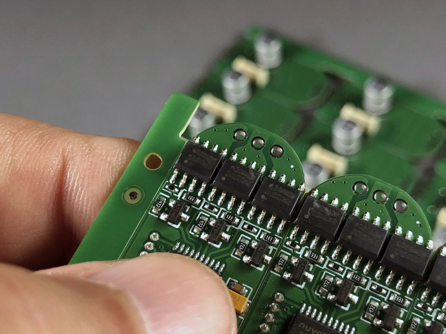 Close up photo of a ProModeler DS930BLHV PCB showing the three FETs, one each for the 3-fields of the AC motor driving the servo.