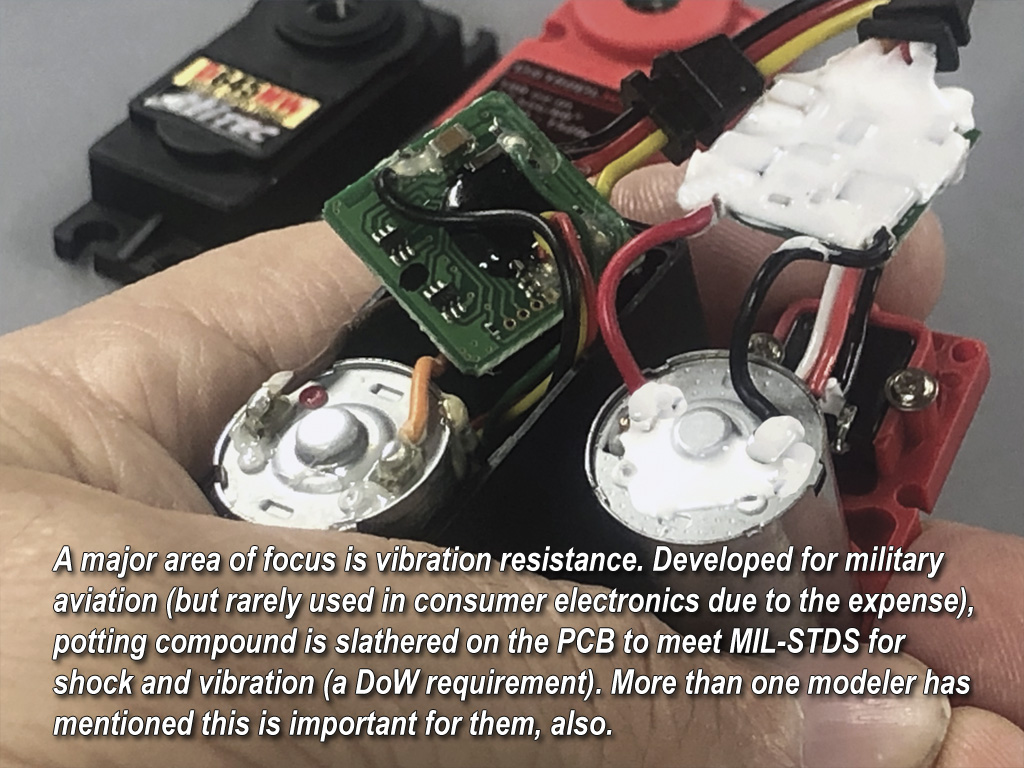comparing the conformal coating on a ProModeler servo and a competitor